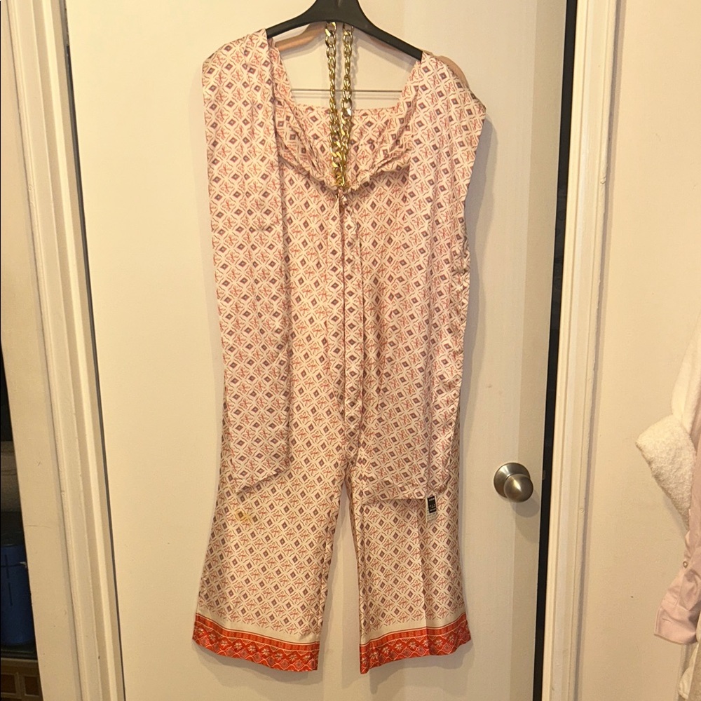 Stylish Pink Jumpsuit with Orange Accents